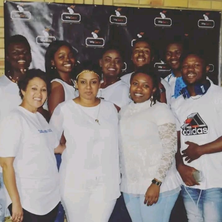 Band playing instruments indoors